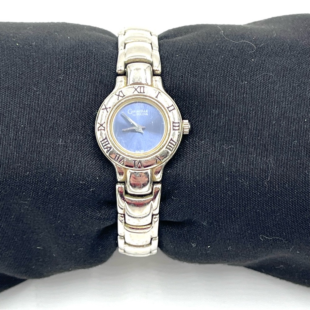 Vintage Caravelle by Bulova Silver Tone Round Blue Face Watch